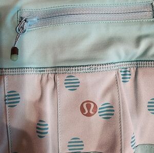 LULULEMON women's skirts/ shorts with a pocket. Size 4tall. Teal blue&white.